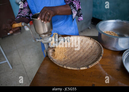 Female baker in her kitchen, Tanzania, Africa Stock Photo