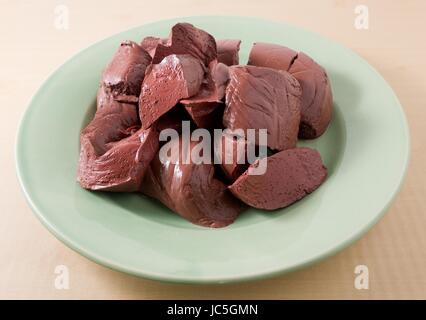 Cuisine and Food, Congealed Pork Blood, Pork Blood Pudding or Pig Blood Curd in A Plated for Asian Cuisine. Stock Photo