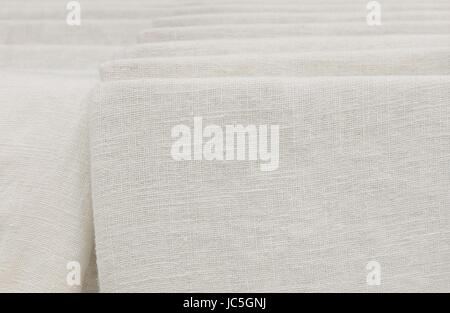 Clothing & Accessories, Stack of White Clean Cotton Fabric in A Shop. Stock Photo