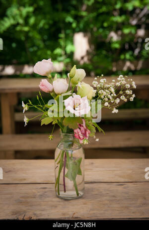 Glass jar of flowers Stock Photo