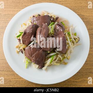 Chinese Traditional Food, Stir Fried Bean Sprout with Congealed Pork Blood, Pork Blood Pudding or Pig Blood Curd. Stock Photo