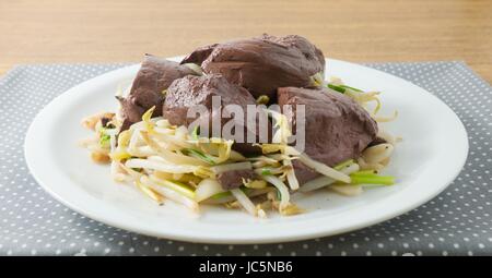 Chinese Traditional Food, Stir Fried Bean Sprout with Pig Blood Curd, Congealed Pork Blood or Pork Blood Pudding. Stock Photo