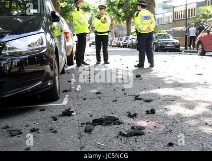 Debris on the ground from a fire that engulfed the 24-storey Grenfell Tower in west London. Stock Photo