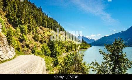 The dirt road along Lillooet Lake just off the Duffy Lake Road between Pemberton and Lillooet in southern British Columbia, Canada Stock Photo