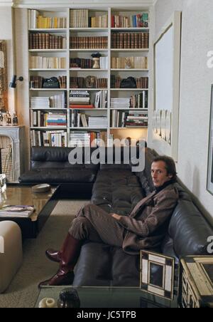 French fashion designer Marc Bohan posing in his Paris appartment, c.1972. Photo Michael Holtz Stock Photo