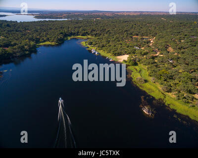 A speedboat seen at Mazvikadei dam in Zimbabwe Stock Photo