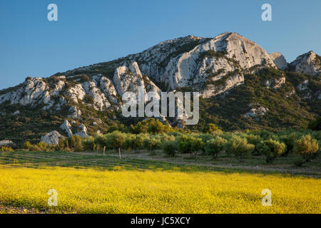 Evening sunlight on mountains of the Chaîne des Alpilles - a mountain range in Southern Provence near Saint-Remy-de-Provence, France Stock Photo