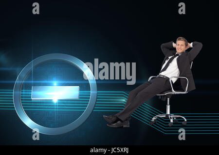 Composite image of young businesssman in office sitting on chair Stock Photo