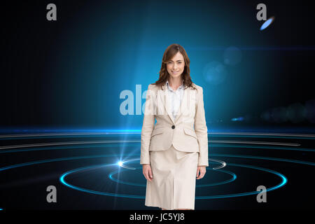 Composite image of smiling brunette businesswoman walking Stock Photo