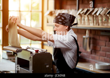 Woman preparing knead for pasta Stock Photo