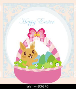 Easter Bunny with basket full of Easter eggs Stock Photo