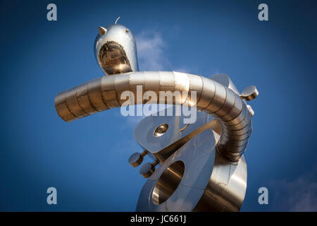 he Traveling Man, one of three stainless steel sculptures in the Deep Ellum area of Dallas, Texas Stock Photo