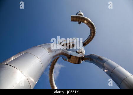 he Traveling Man, one of three stainless steel sculptures in the Deep Ellum area of Dallas, Texas Stock Photo