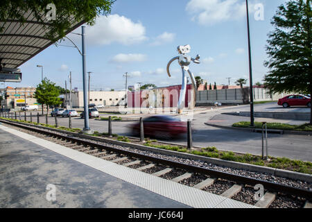 he Traveling Man, one of three stainless steel sculptures in the Deep Ellum area of Dallas, Texas Stock Photo