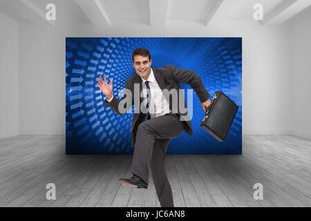 Composite image of happy attractive businessman in a hury Stock Photo