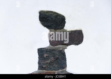 View of a stone surface of plastered external wall - for background purposes Stock Photo