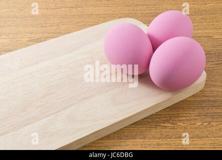Asian Traditional Food, Pink Century Eggs or Pidan Eggs Made By Duck, Chicken or Quail Eggs in A Mixture of Ash, Salt, Red Lime, Sodium Carbonate, Tea Stock Photo