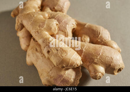 a whole fresh ginger root from China, an important ingredient in Asian cooking Stock Photo