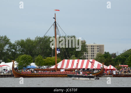 BAY CITY, MI - JULY 17: Visitors explore the viking longship Draken Harald Harfagre at the Tall Ship Celebration in Bay City, MI on July 17, 2016. Stock Photo