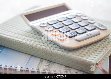 Calculator on two of notebooks, stock photo Stock Photo