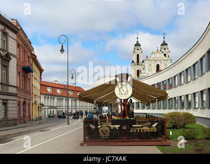 VILNIUS,  LITHUANIA- APRIL 30, 2017:  The street beer Svyturis (Beacon) restaurant is located near a gymnasium  of a name of the great Lithuanian poet Stock Photo