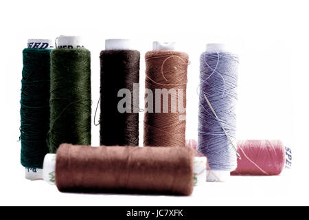 Tailor's threads, isolated on white. Stock Photo
