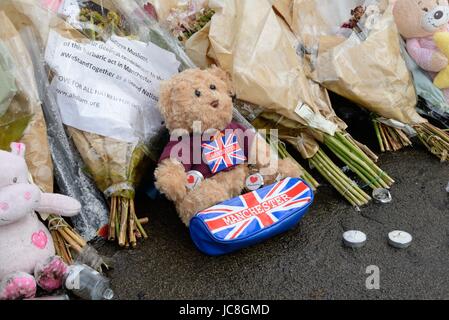 A variety of objects left at George Square, Glasgow to commemorate and honour the victims of the Manchester and London terrorist attacks. Stock Photo