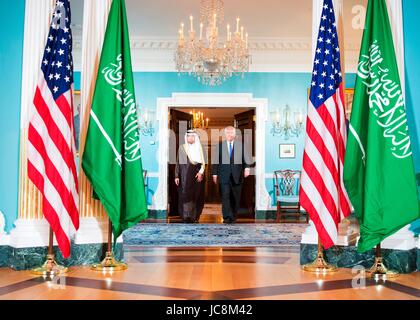Washington, USA. 13th Jun, 2017. U.S. Secretary of State Rex Tillerson and Saudi Foreign Minister Adel al-Jubeir walk together before bilateral talks at the State Department June 13, 2017 in Washington, D.C. Saudi Arabia is currently leading a coalition of gulf Arab nations to isolate and pressure Qatar. Credit: Planetpix/Alamy Live News Stock Photo