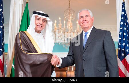 Washington, USA. 13th Jun, 2017. U.S. Secretary of State Rex Tillerson and Saudi Foreign Minister Adel al-Jubeir shake hands before bilateral talks at the State Department June 13, 2017 in Washington, D.C. Saudi Arabia is currently leading a coalition of gulf Arab nations to isolate and pressure Qatar. Credit: Planetpix/Alamy Live News Stock Photo