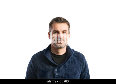 Mature hipster man in blue sweater. Studio shot, isolated. Stock Photo