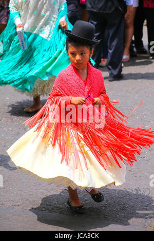 Local girl performing during Festival of the Virgin de la Candelaria in Lima, Peru. The core of the festival is dancing and music performed by differe Stock Photo