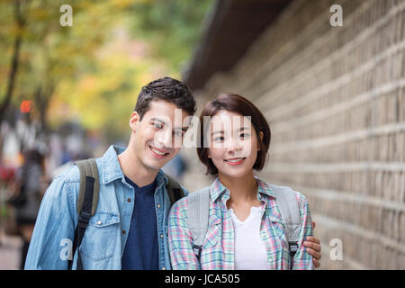 Portrait of smiling multicultural couple Stock Photo