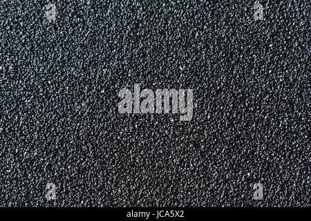 Sandpaper surface super close-up view. Magnification about 100 times. Stock Photo