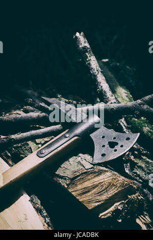 English civil war axe in an encampment at a Sealed Knot English Civil war reenactment event. Charlton park, Malmesbury, Wiltshire, UK Stock Photo