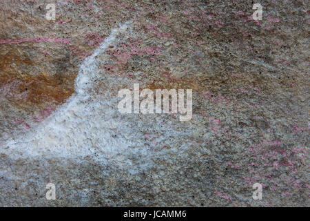 Concrete surface with spots of rust, lime and paint Stock Photo