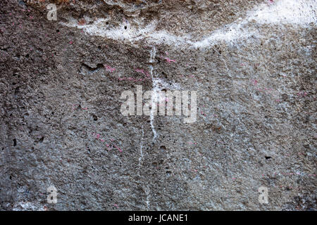 Concrete surface with spots of rust, lime and paint Stock Photo
