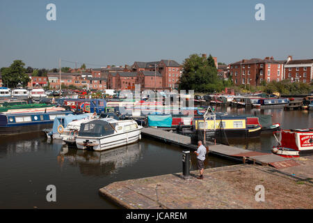Traditional narrowboats moored in Stourport Basin on the Staffs and Worcs Canal in the town of Stourport on Severn Stock Photo