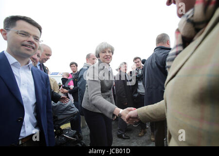 EXCLUSIVE FILE IMAGES - Britian's Prime Minister Theresa May and Northern Ireland Secretary of State for Northern Ireland James Brokenshire chats with DUP leader Arlene Foster during a tour of the Balmoral Show, Lisburn, County Antrim, Saturday May 13, 2017. Photo/Kalista McErlane