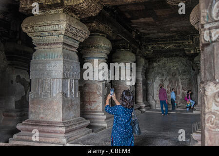 Ellora, India - 15th August 2016: People visiting to the caves in Ellora, Maharashtra state in India Stock Photo