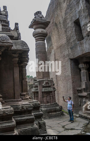 Ellora, India - 15th August 2016: People visiting to the caves in Ellora, Maharashtra state in India Stock Photo