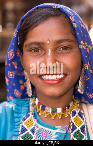 Indian lady in traditional tribal outfit at the annual Desert Festival in Jaisalmer, Rajasthan, India. Stock Photo