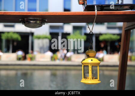 Lunchtime at canalside KuPP restaurant on Paddington Basin, in west London, UK Stock Photo