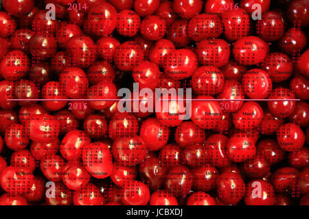 office calendar for 2014 - 2017 years on the background of berries of cherry Stock Photo