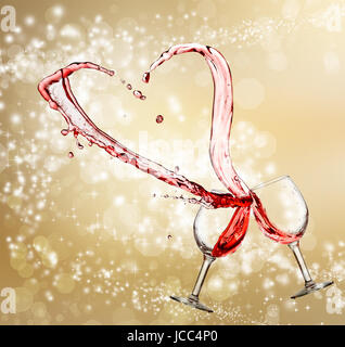 Heart splash from two glasses of red wine over golden light background Stock Photo