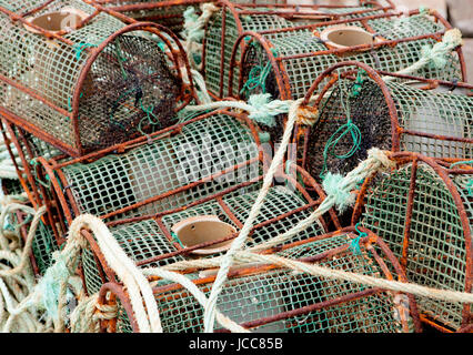 Many octopus traps stacked at the port Stock Photo