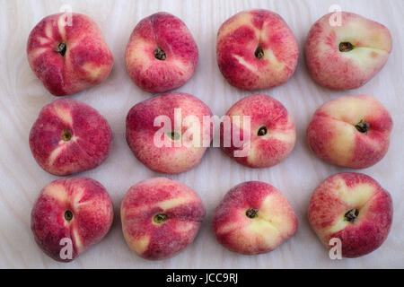 Flat Lay of 12 Saturn Peach Stock Photo