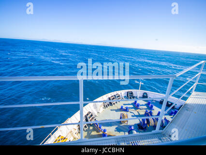 Beautiful view of ocean from Ferries that provide daily connection between North and South islands with a beautiful blue sky located in New Zealand. Stock Photo