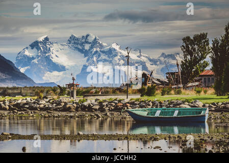 Puerto Natales harbour in front of snowy mountainscape