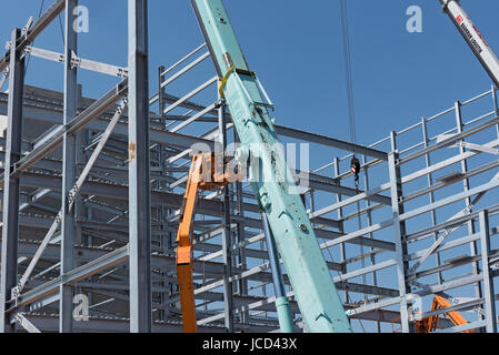 Steel construction of an industrial building under Stock Photo