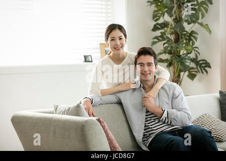 Harmonious multicultural family couple Stock Photo